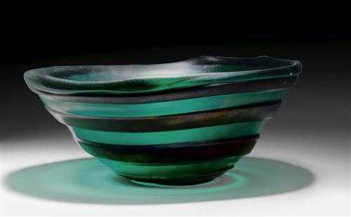 Appraisal: SWEDISH LARGE BOWL circa Burgundy and green iridescent glass H