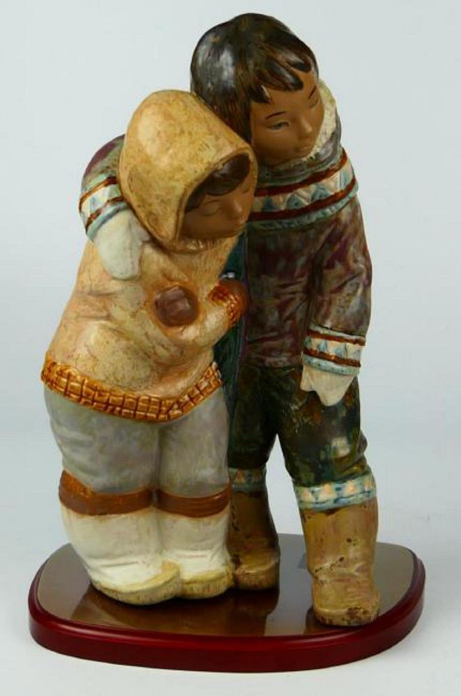 Appraisal: LLADRO GRES ESKIMO BOY GIRL Lladro Spanish Gres porcelain group