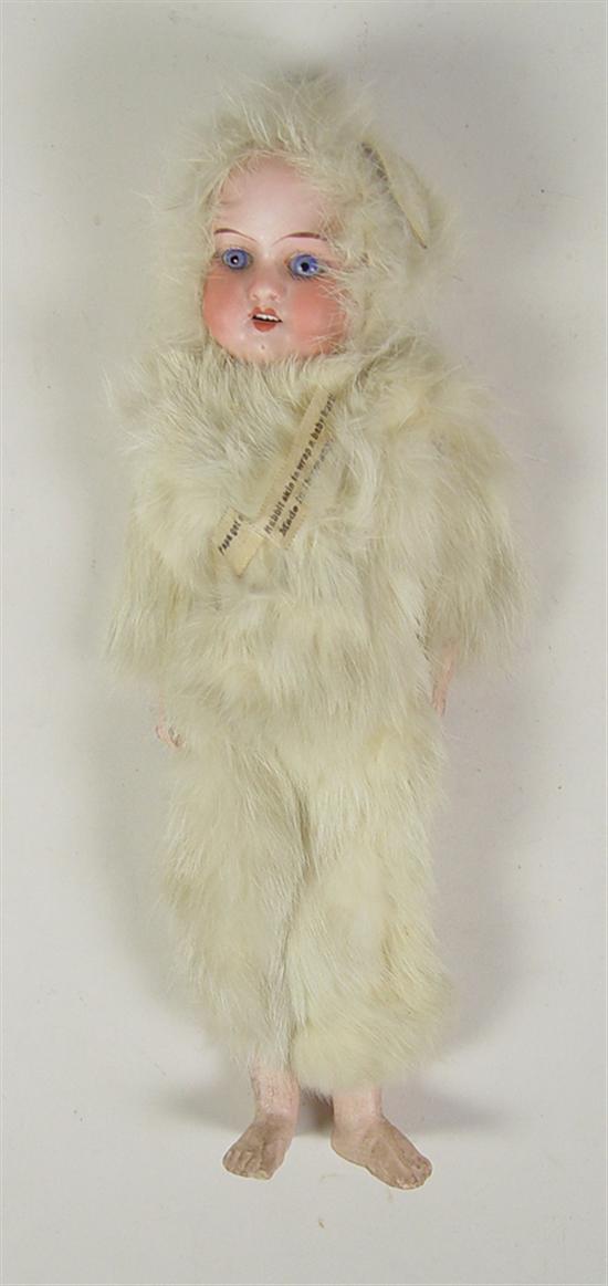 Appraisal: German Character Doll in Rabbit Suit Blue fixed eyes Open