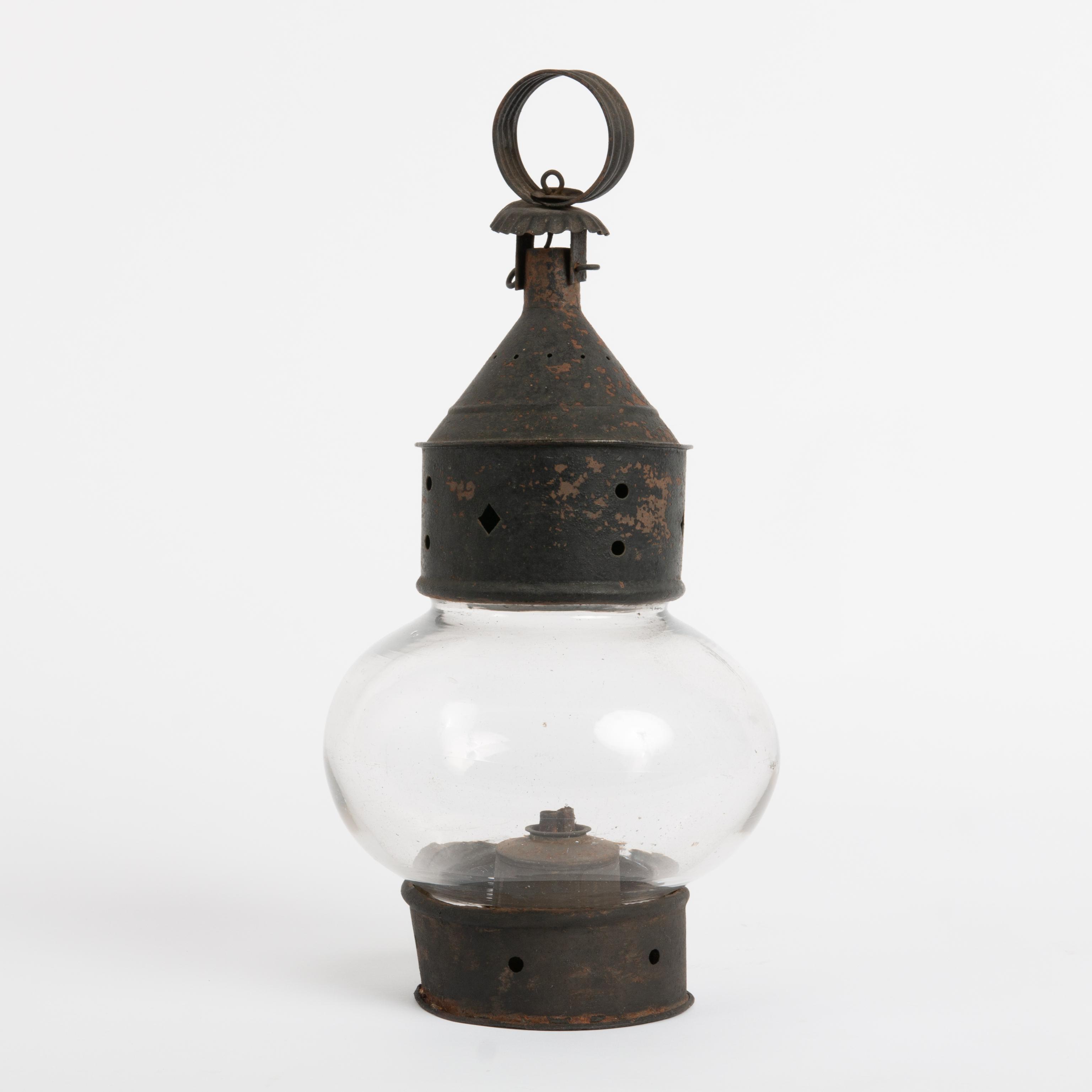 Appraisal: PIERCED TIN FIXED ONION GLOBE LANTERN A pierce tin onion