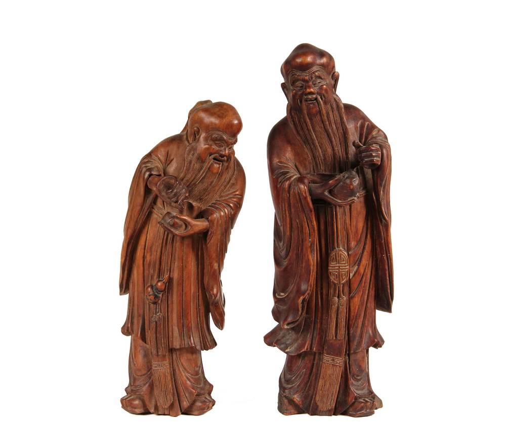 Appraisal: CHINESE WOOD CARVINGS - Standing Figures of Shou Lao the