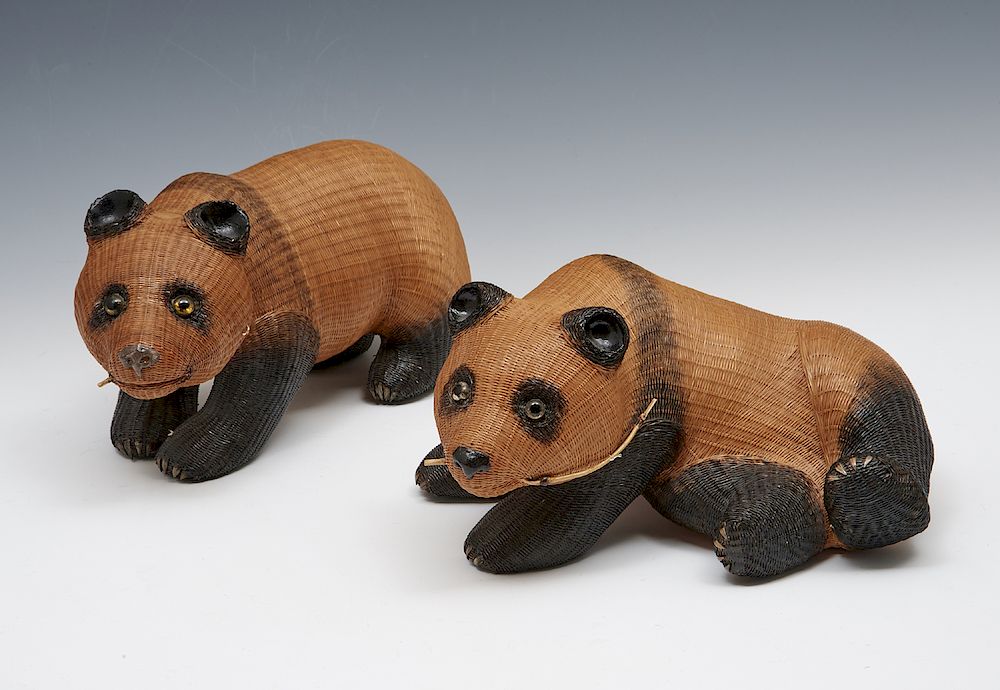 Appraisal: Pair of Chinese woven straw panda bears w glass eyes