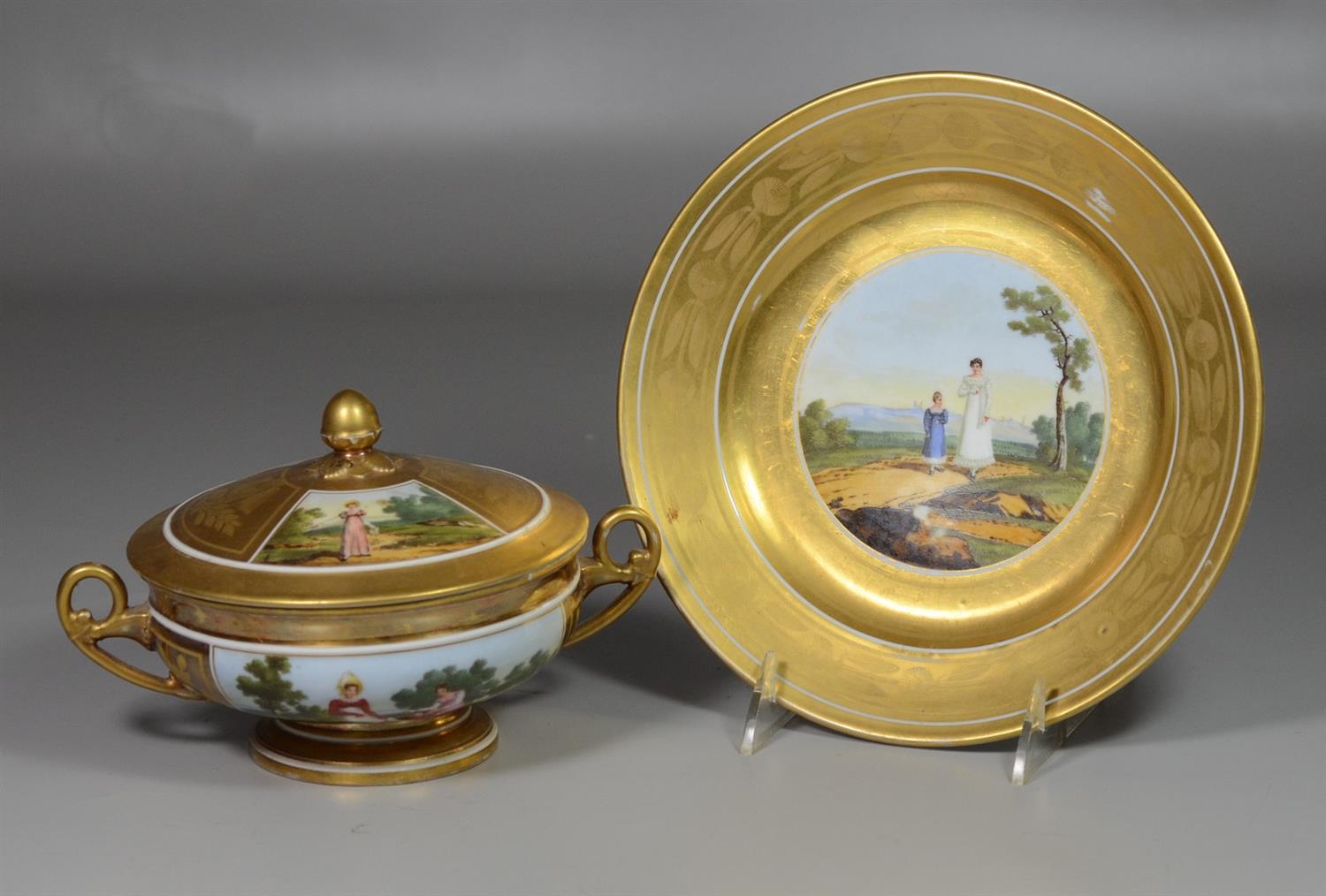 Appraisal: Paris Porcelain Covered Bowl and Underplate fine gilding pastoral decoration