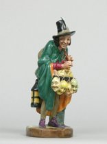 Appraisal: Royal Doulton Mask Seller England circa Modeled as a man