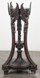 Appraisal: Carved mahogany pedestal ca with winged cherub supports '' h