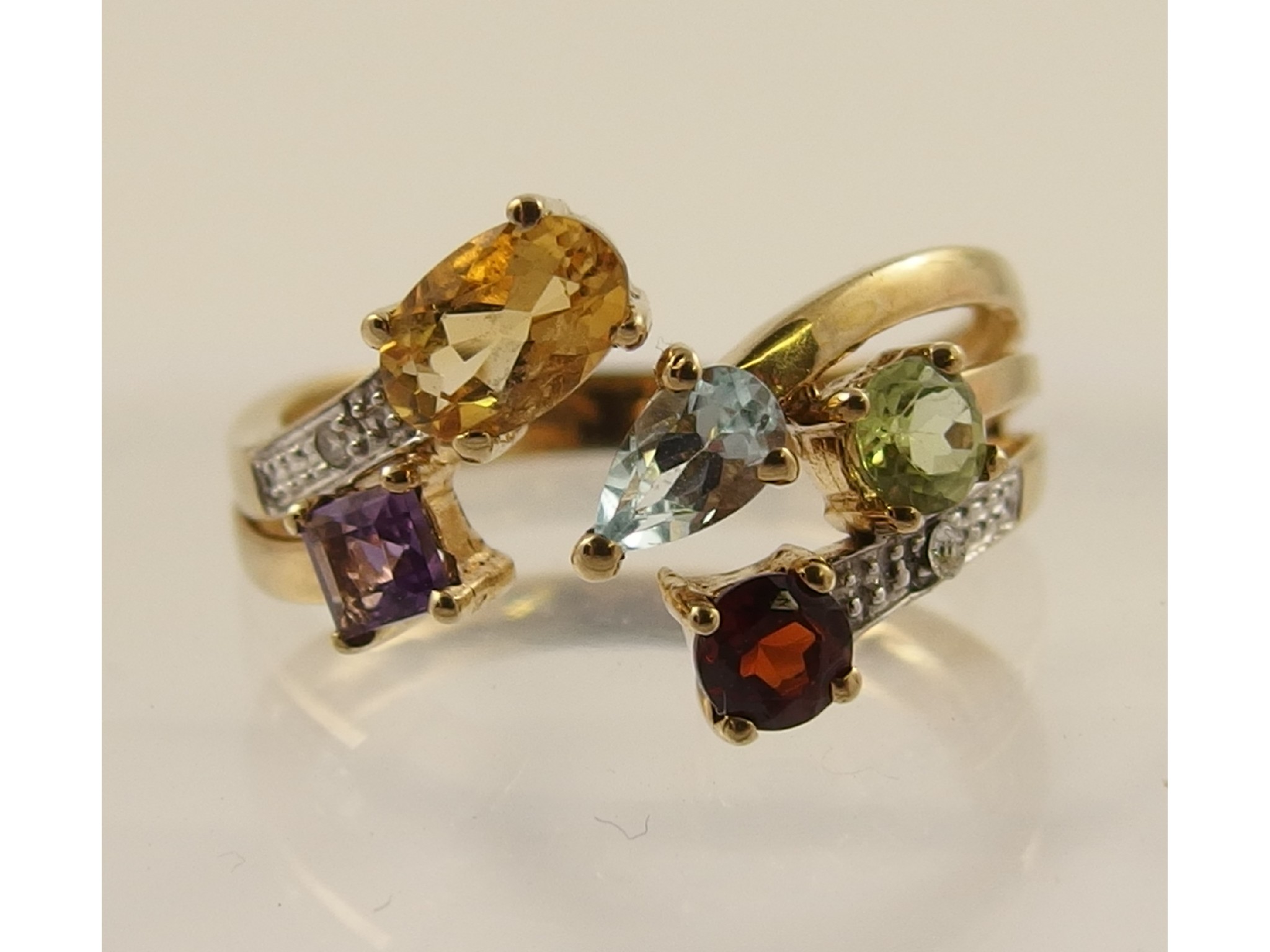 Appraisal: A ct multi colour gem set ring