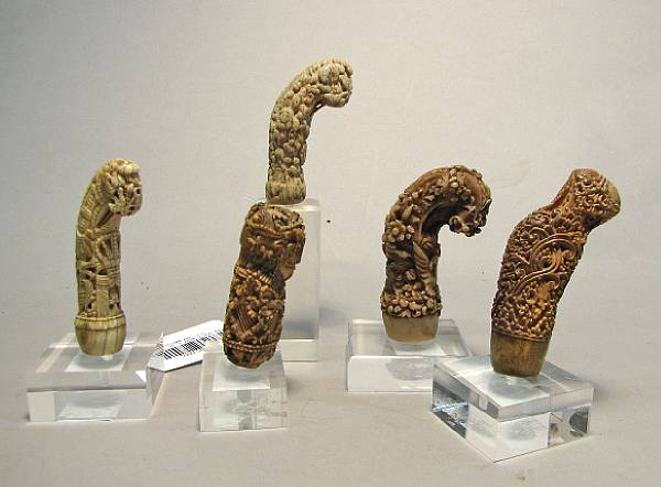 Appraisal: A lot of five Indonesian keris hilts th th century