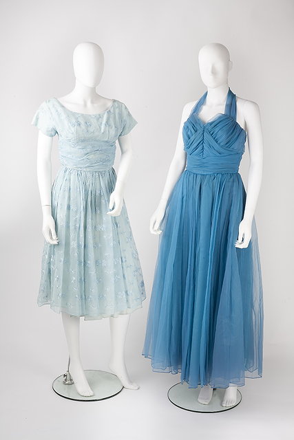 Appraisal: Four evening dresses comprising a s blue crepe dress ruched