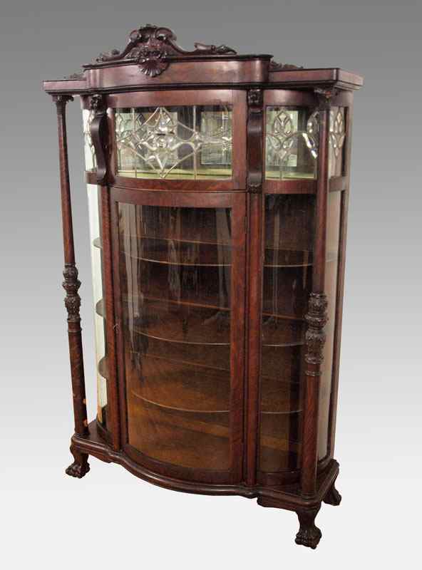 Appraisal: LEADED GLASS TRIPLE BOW FRONT CHINA CABINET Two door bowfront