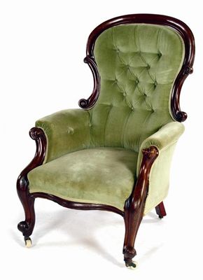 Appraisal: A Victorian mahogany show frame gentleman's easy armchair with a