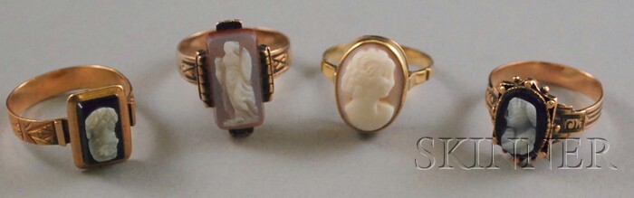 Appraisal: Four Low-karat Gold and Carved Cameo Rings total dwt sizes