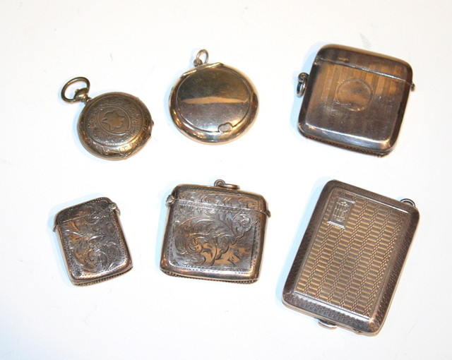 Appraisal: FOUR SILVER VESTA CASES with engraved and engine turned decoration