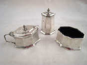 Appraisal: A stylish Art Deco silver cruet set of elongated octagonal