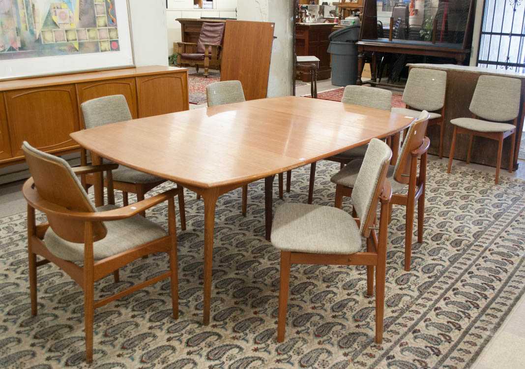 Appraisal: TEAK MID-CENTURY MODERN DINING TABLE AND CHAIR SET Denmark dated