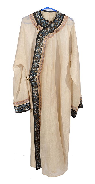 Appraisal: A CHINESE SHOT SILK ROBE with embroidered collar and sleeve