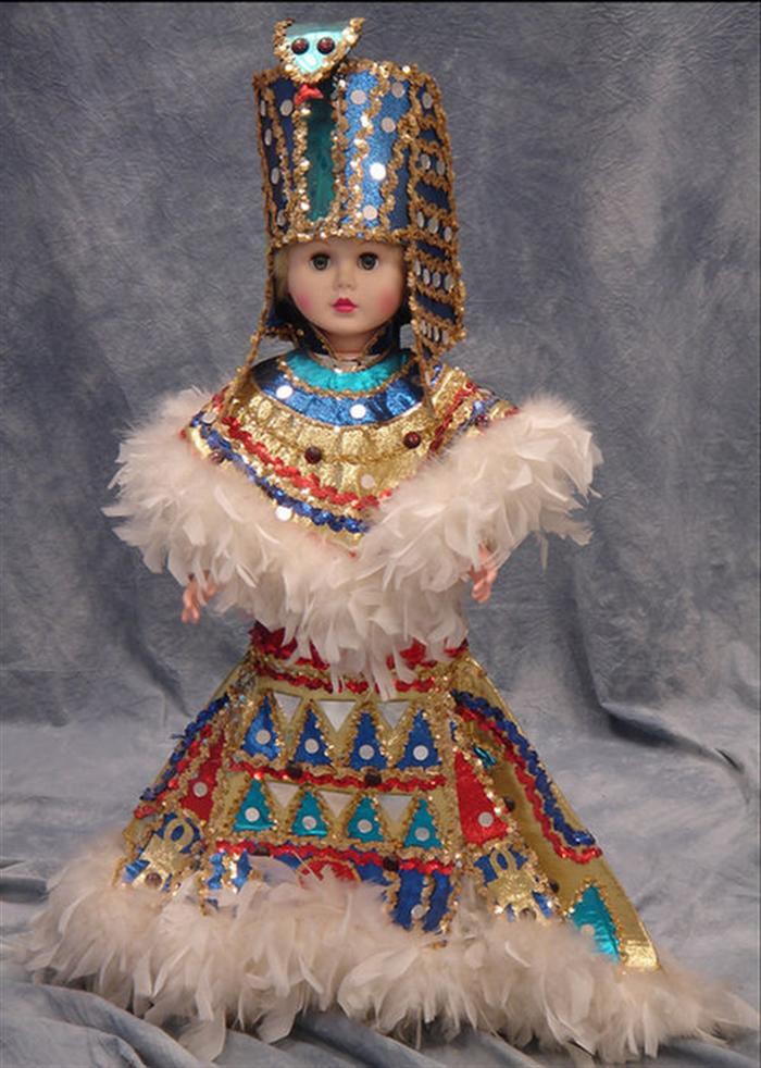 Appraisal: Mummers doll dressed in Egyptian style Estimate -