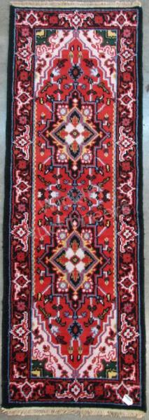 Appraisal: A Handmade Oriental Runner Heriz design red field with grey