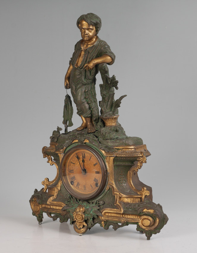 Appraisal: N MULLER FIGURAL BOY WITH FISH MANTLE CLOCK Patinated and