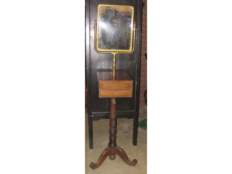 Appraisal: CONTINENTAL TH CENTURY MAHOGANY SHAVING STAND The double hinged top