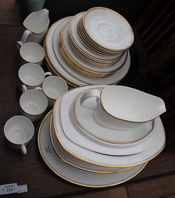 Appraisal: A ROYAL DOULTON GOLD CONCORD PATTERN DINNER SERVICE consisting of