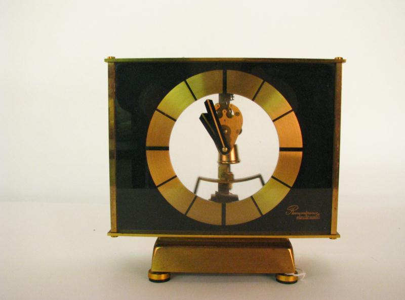 Appraisal: Mid-Century Modern Brass Mantle Clock with perpetual motion driven works