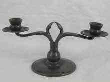 Appraisal: A Liberty ''Tudric'' two light candelabrum cm across