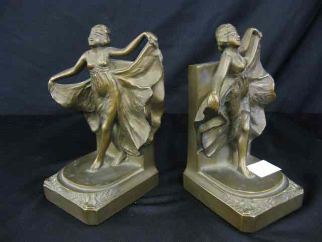 Appraisal: Art Deco Bronzed Figural Bookendsof dancing lady in fancy gown