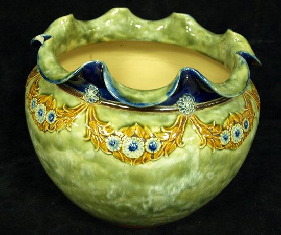 Appraisal: A Royal Doulton jardiniere of mottled green glaze the fluted