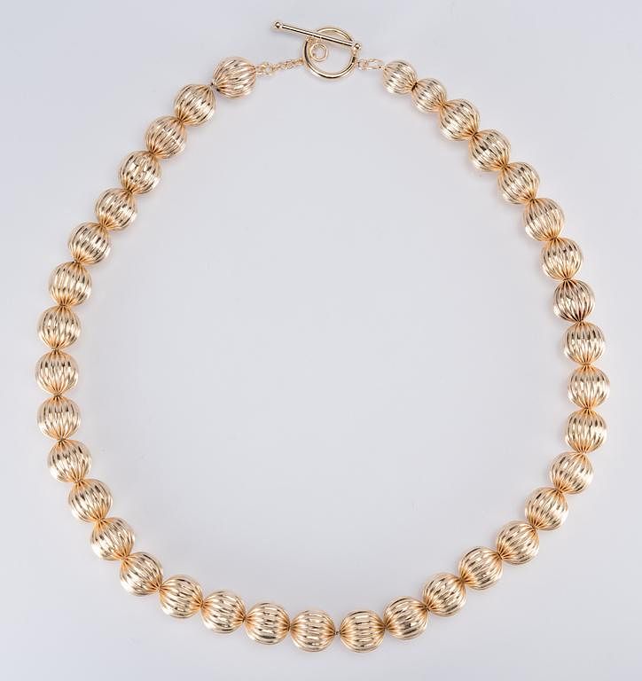 Appraisal: K Bead Necklace - L K yellow gold bead necklace