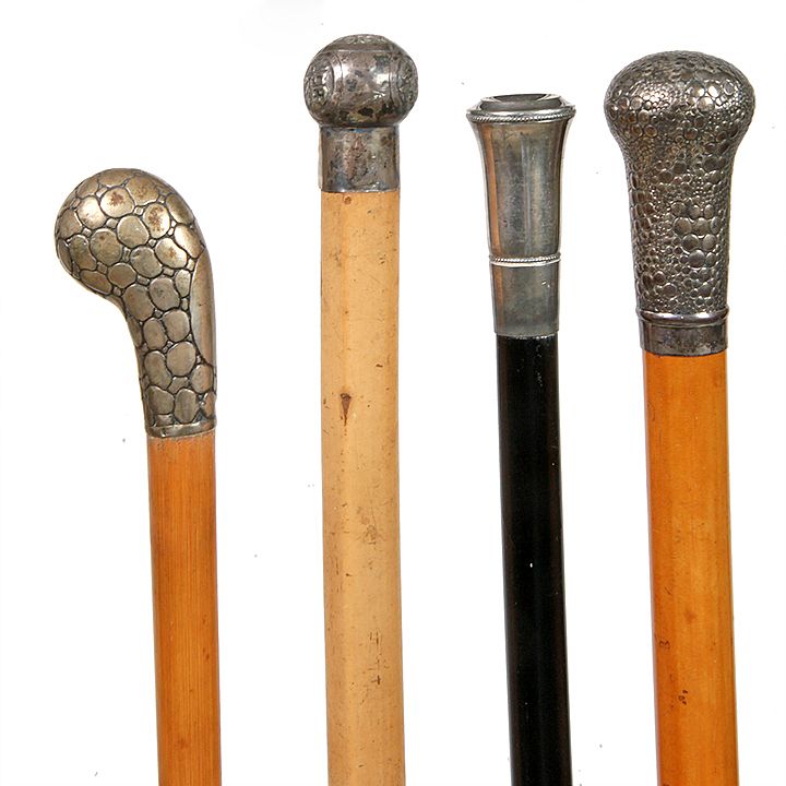 Appraisal: Group of Four Silver Cane - - One with ebony