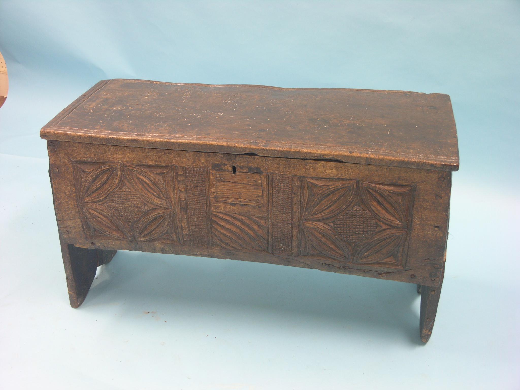 Appraisal: A small th century boarded oak coffer six-plank construction frontage