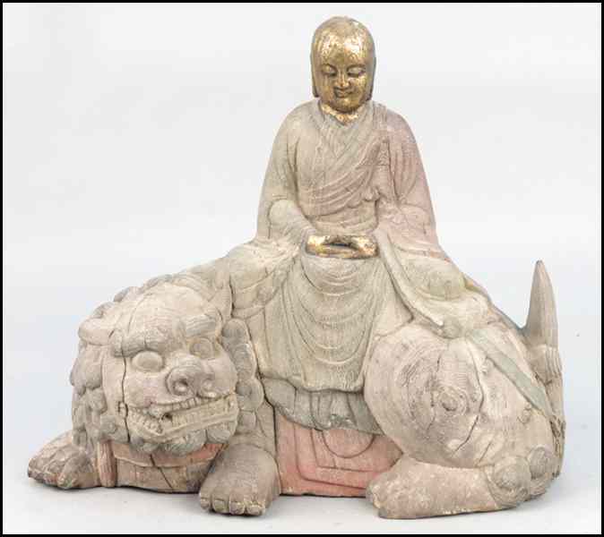 Appraisal: CARVED AND PAINTED WOOD SEATED BUDDHA Depicted atop a foo