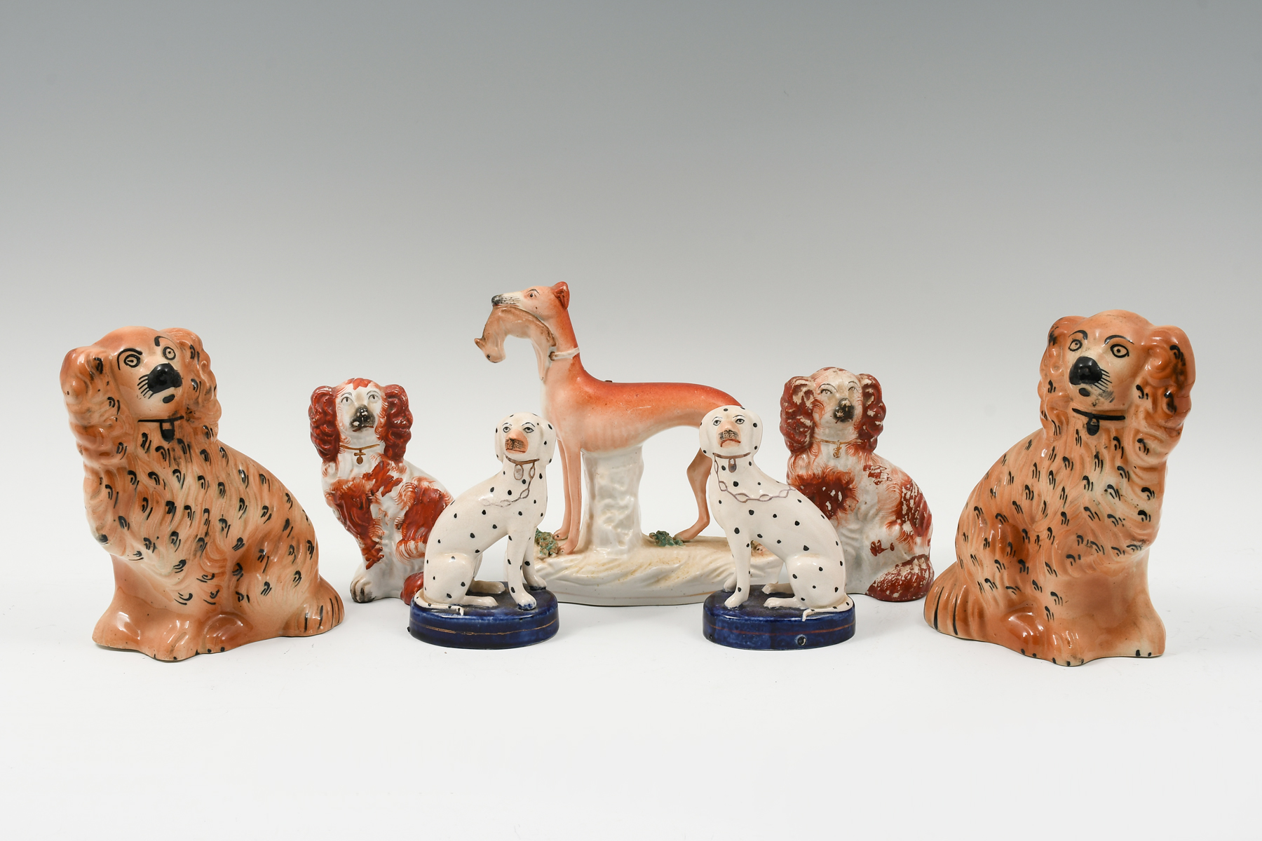 Appraisal: PC ENGLISH STAFFORDSHIRE PORCELAIN DOGS Comprising - Pairs of Spaniels