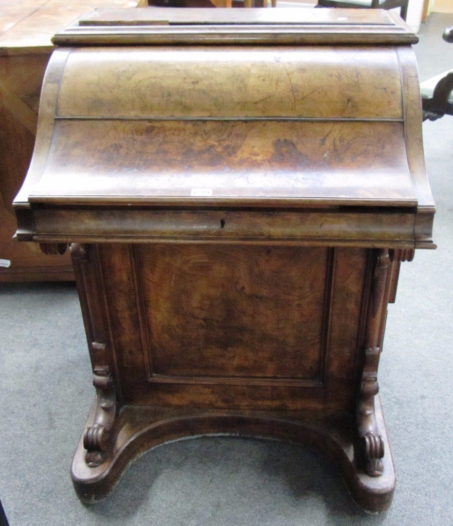 Appraisal: A Victorian walnut piano top Davenport with pop up superstructure