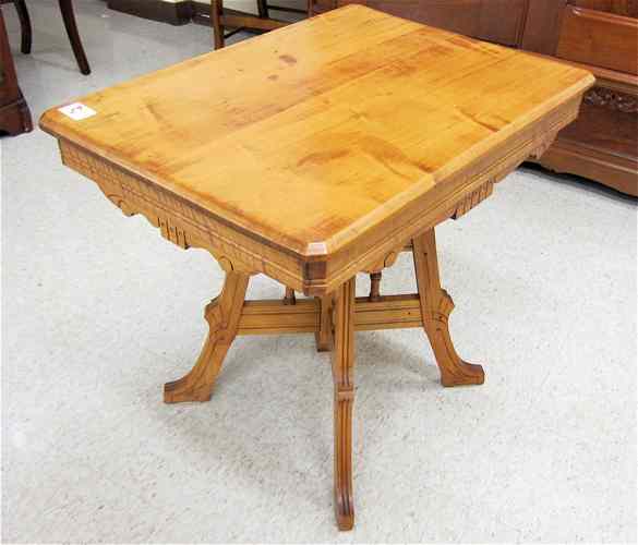 Appraisal: VICTORIAN MAPLE LAMP TABLE Eastlake design American c having a