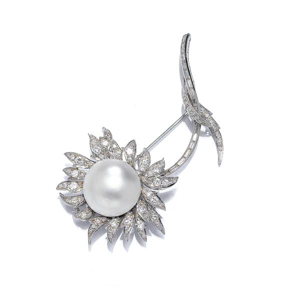 Appraisal: A PEARL AND DIAMOND BROOCH circa White gold Decorative brooch