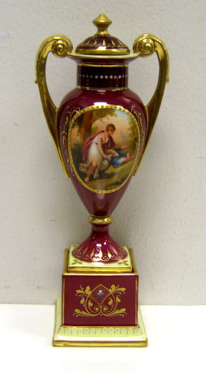 Appraisal: AUSTRIAN PORCELAIN MINIATURE LIDDED URN Franz Dorfl Vienna circa burgundy