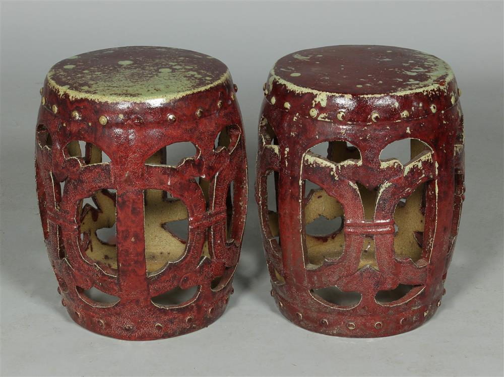 Appraisal: PAIR OF CHINESE SANG-DE-BOEUF-GLAZED GARDEN STOOLS of barrel form the