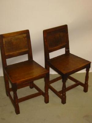 Appraisal: A PAIR OF ADZED OAK SIDE CHAIRS by Robert Mouseman