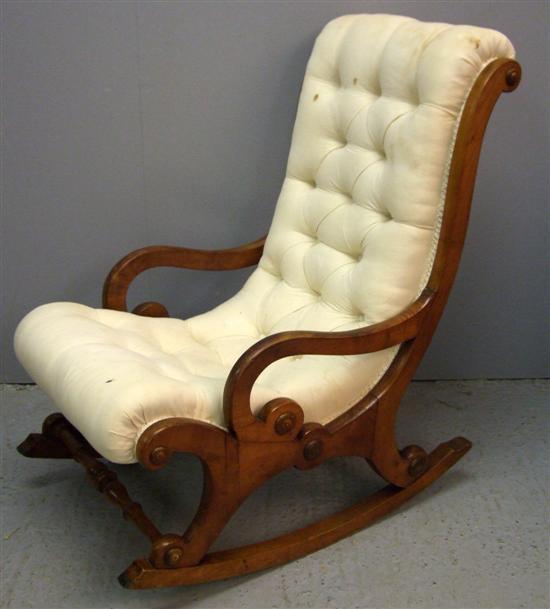 Appraisal: th century walnut button backed rocking chair h in