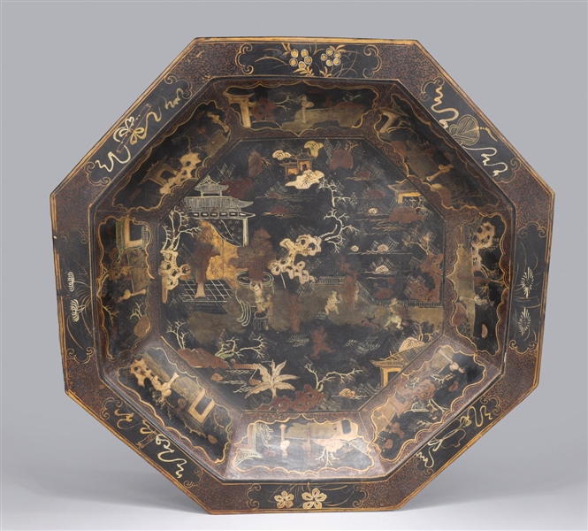 Appraisal: Chinese octagonal porcelain imitating lacquer charger with gilt designs W