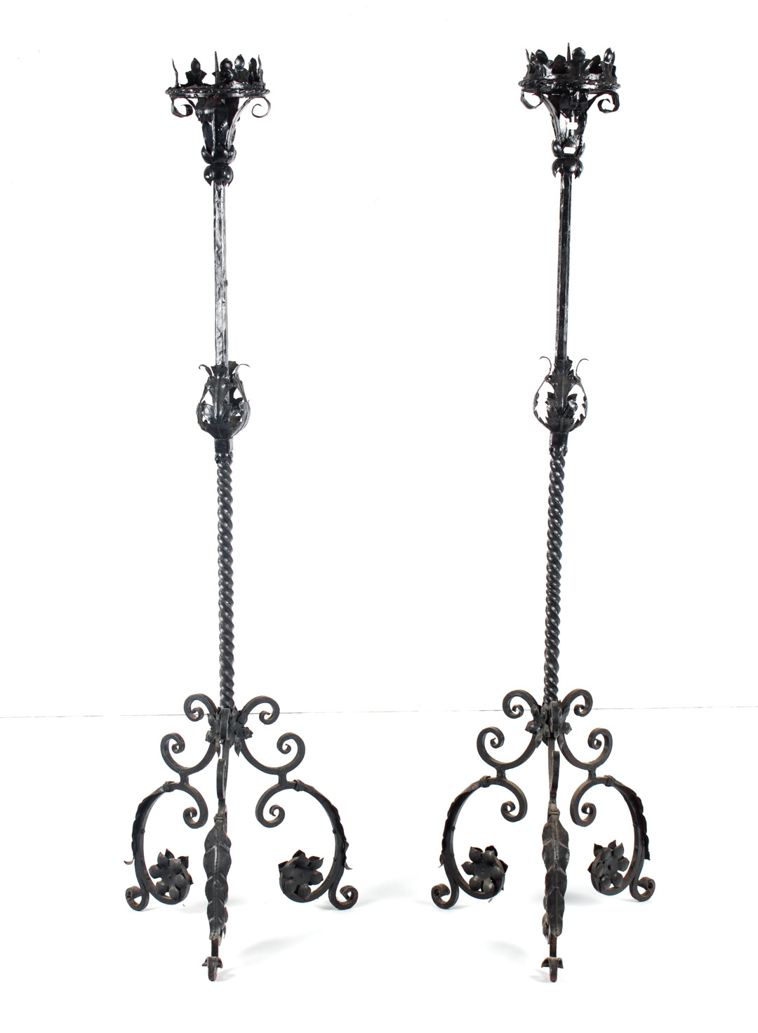 Appraisal: Pair of Neo-Gothic wrought iron candlesticks first half- th century