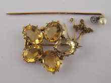 Appraisal: A yellow metal tests carat gold five stone citrine brooch