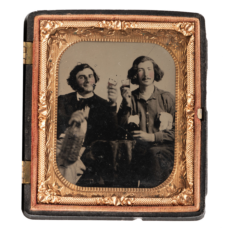 Appraisal: EARLY PHOTOGRAPHY Sixth plate ruby ambrotype of two men imbibing