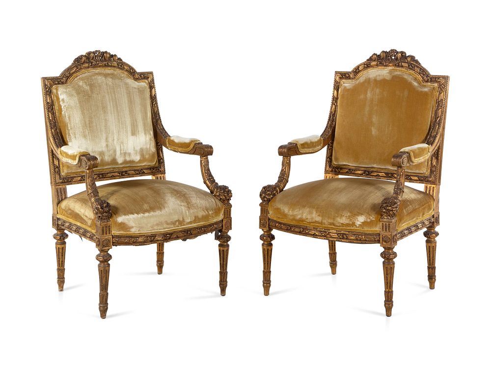 Appraisal: A Pair of Louis XVI Carved Giltwood Fauteuils A Pair