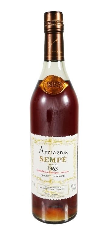 Appraisal: French Armagnac Sempe sealed bottle in original wooden box Contents