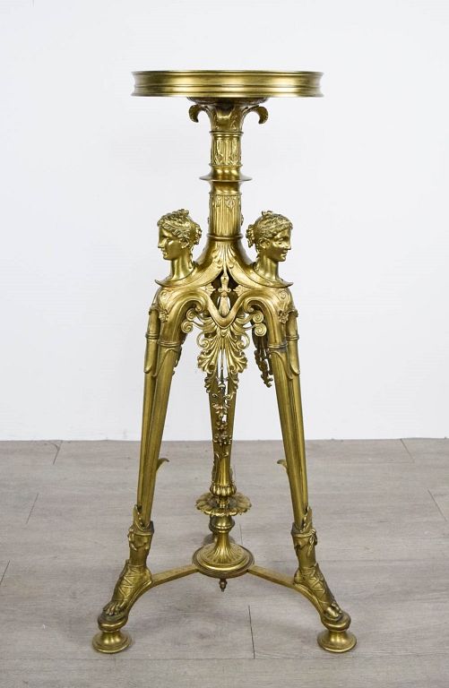 Appraisal: Figural Brass Gueridon Figural Brass Gueridon with Brass Legs Brass