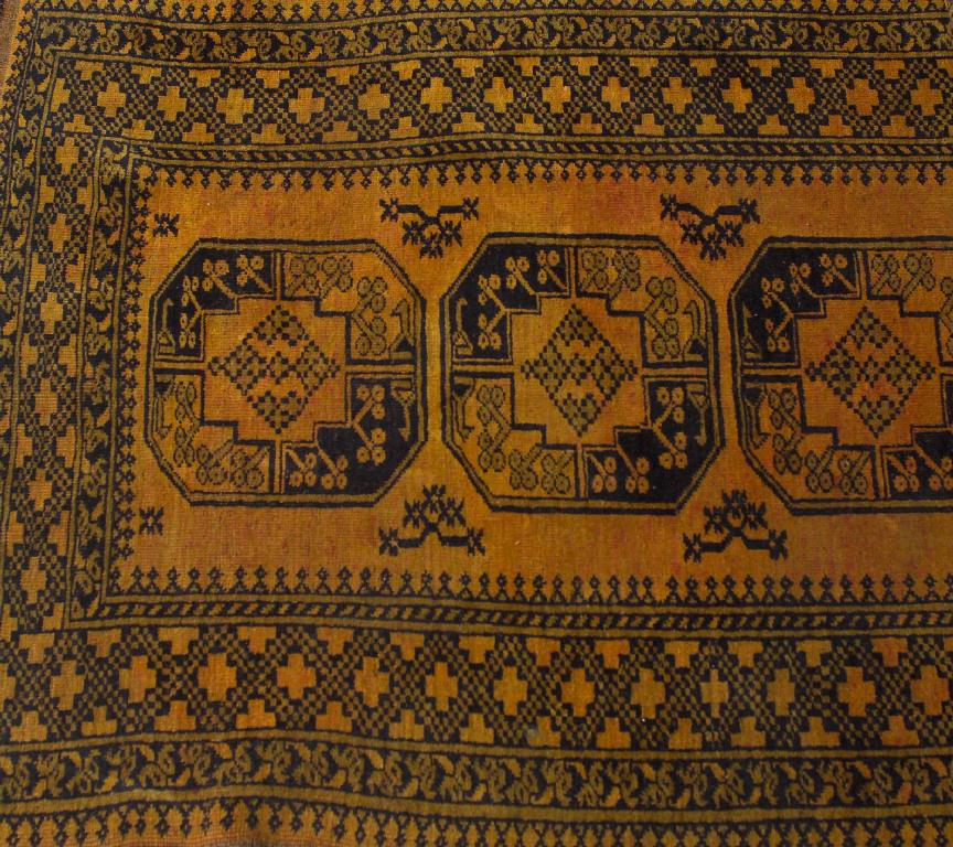 Appraisal: SULEMAN AFGHAN RUG with a rust coloured ground m by