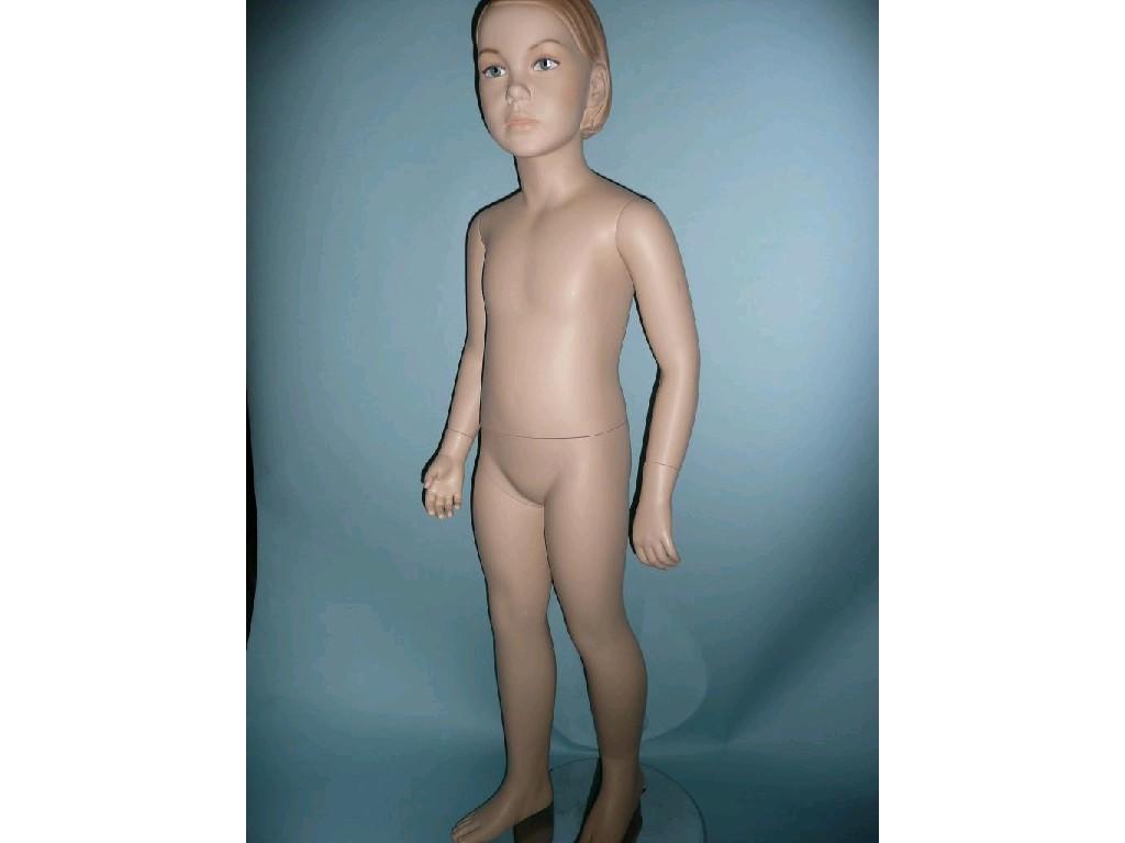 Appraisal: A girl child mannequin with moulded hair detachable arms and