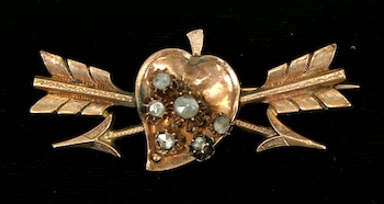 Appraisal: A Victorian Heart and Arrows Pin Set with Diamonds An